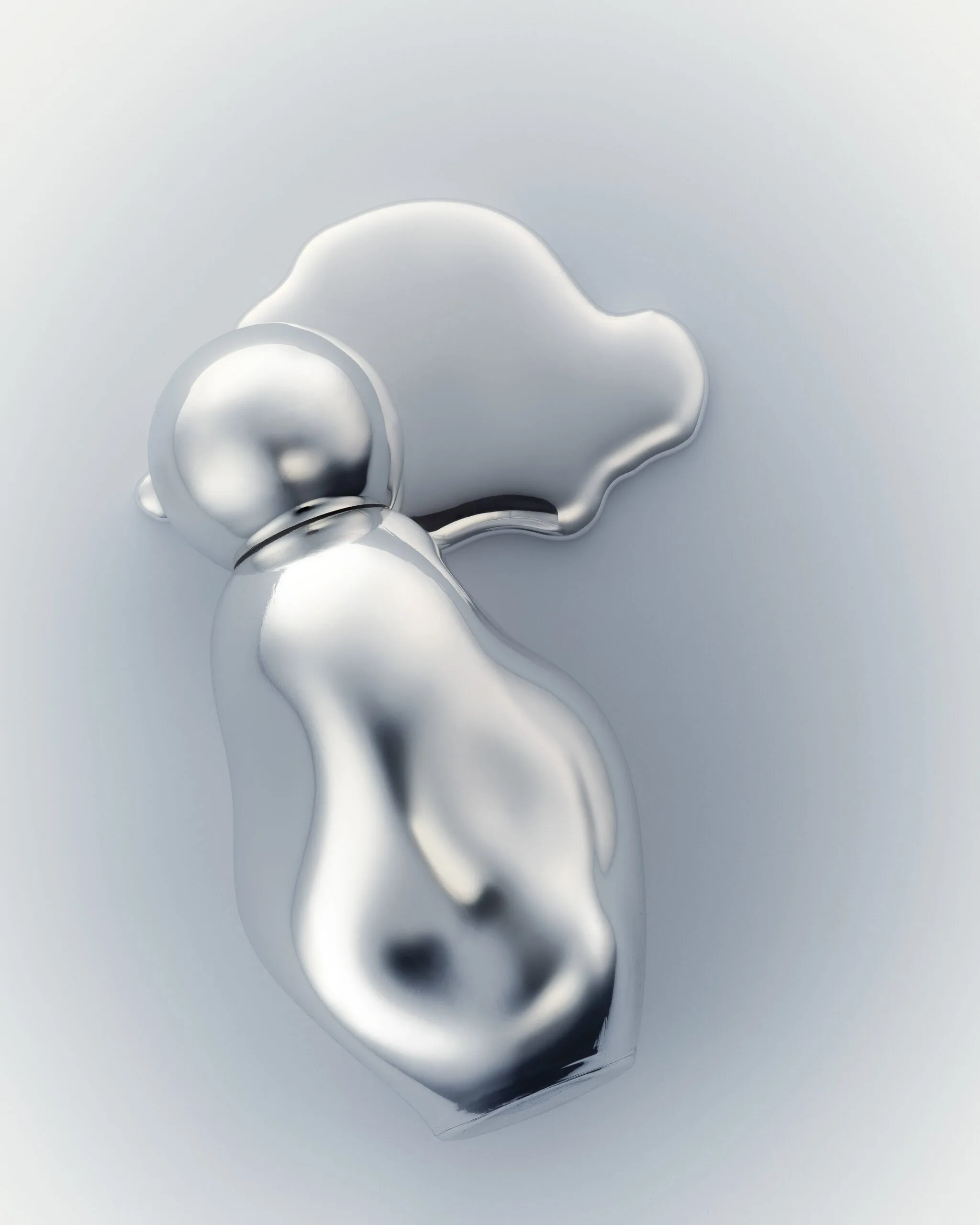 Melted chrome perfume bottle with a round cap beside a liquid silver puddle on a pale grey background, for Kylie Cosmetics.