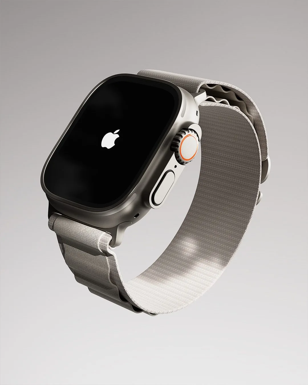 CGI render of a titanium Apple Watch Ultra with a grey woven loop band and Apple logo on screen, for Apple.