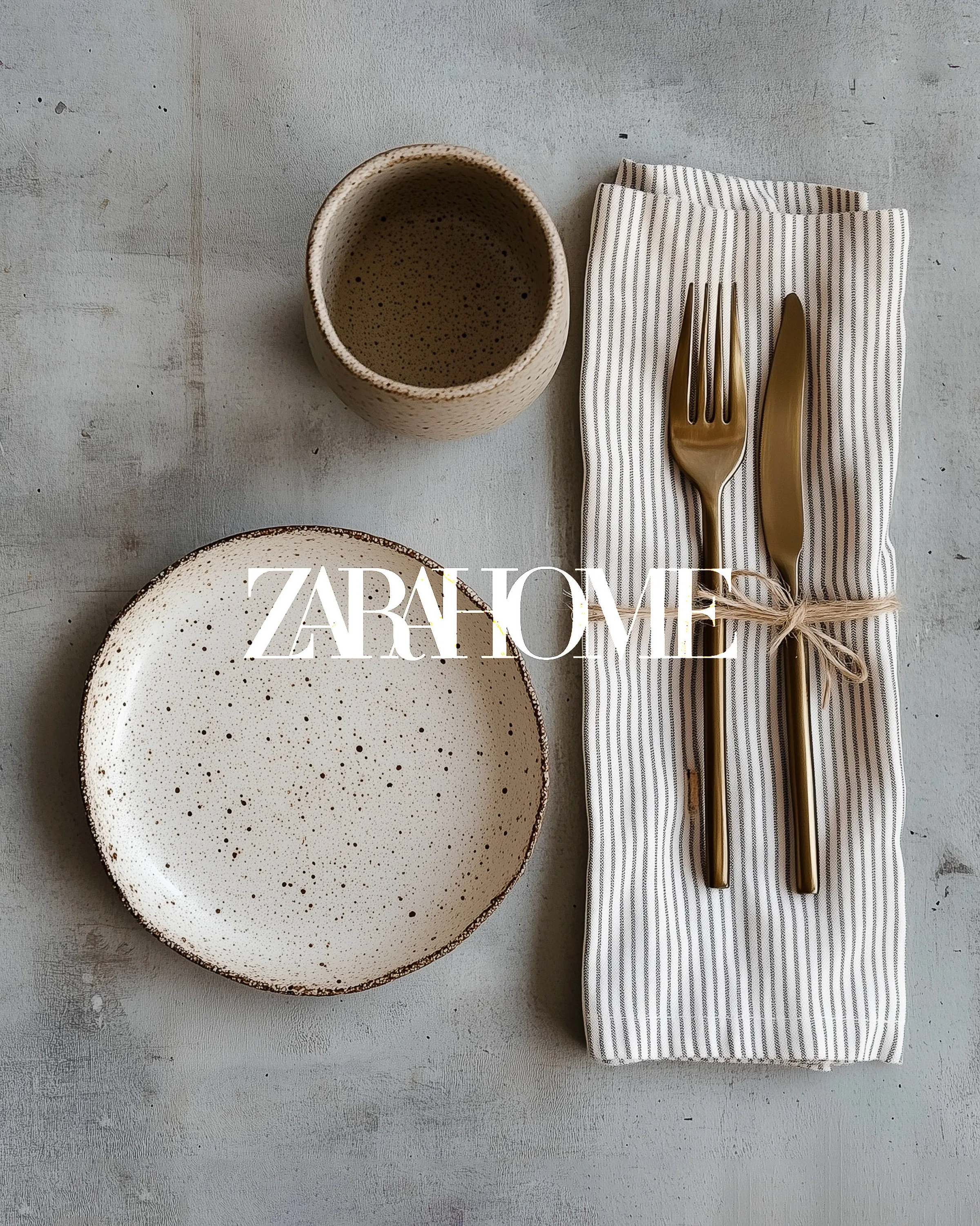 AI image of a speckled stoneware plate and cup with gold cutlery on a striped napkin on grey concrete. Zara Home AI Concept.