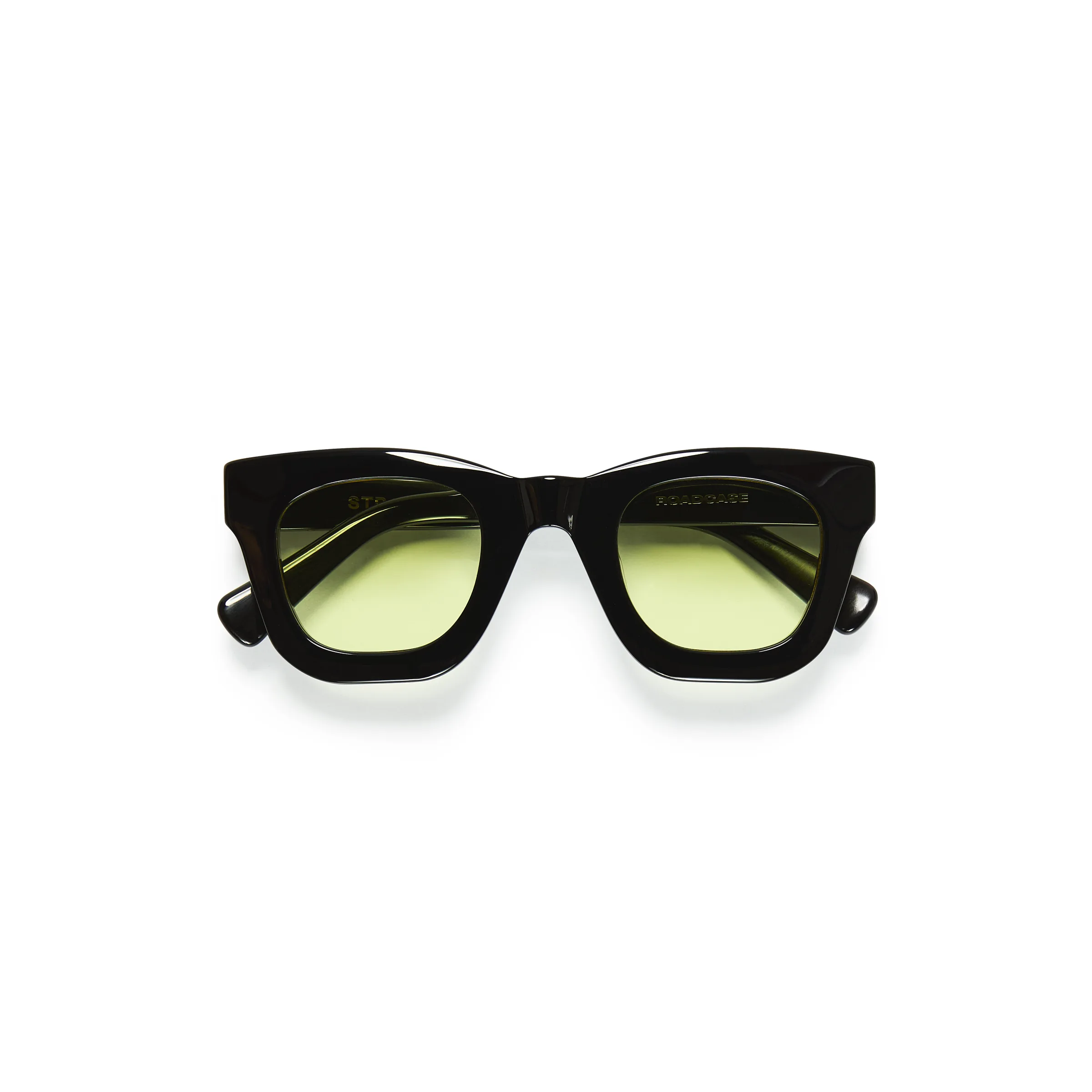 Black acetate Roadcase sunglasses with lemon-yellow tinted lenses, folded flat on a white background, for Strata.