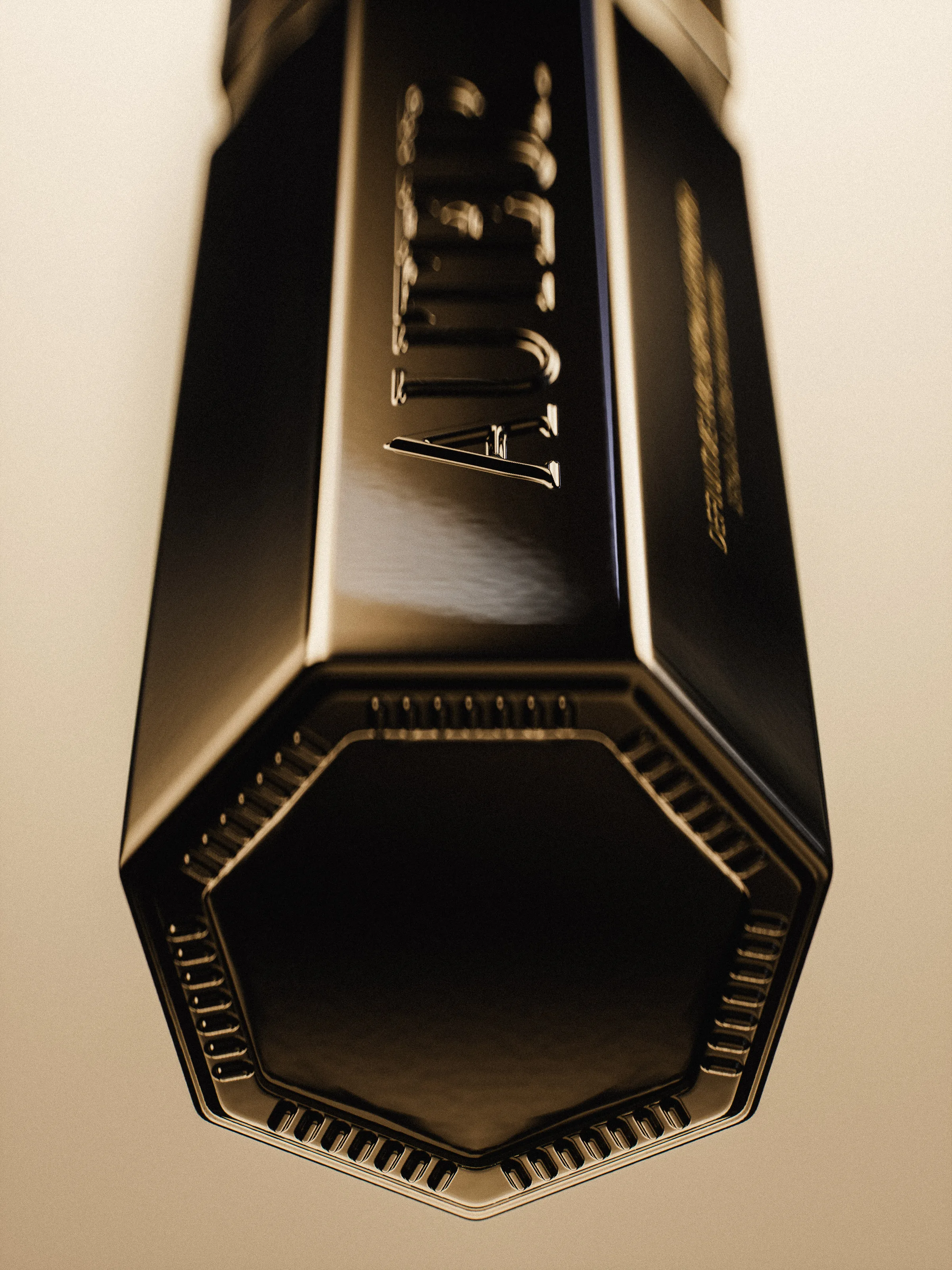 CGI render of a black octagonal bottle with embossed lettering, seen from below on a warm beige backdrop, for Auteur.