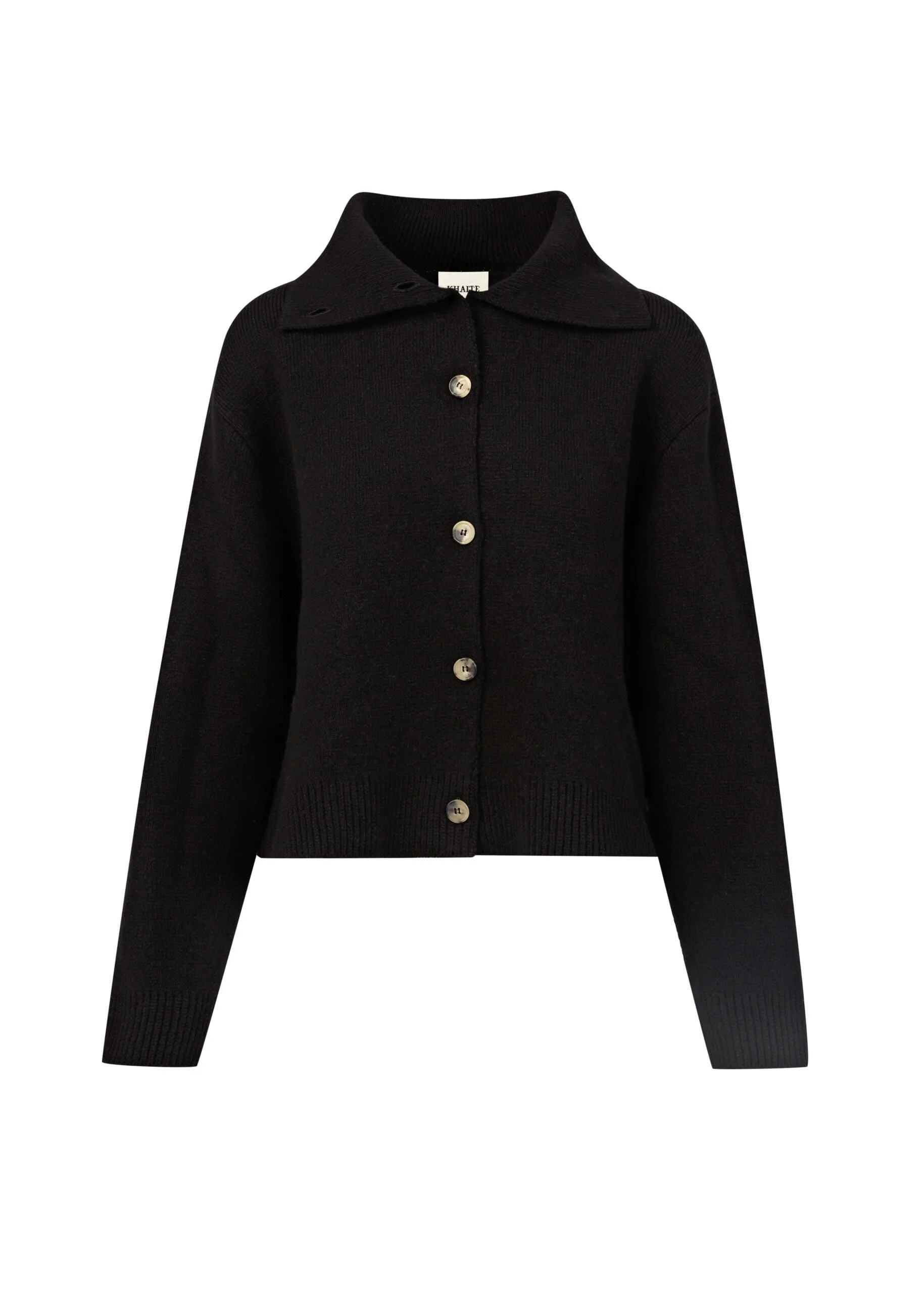 Black knit cardigan with wide collar and horn buttons on a white background, for Khaite.