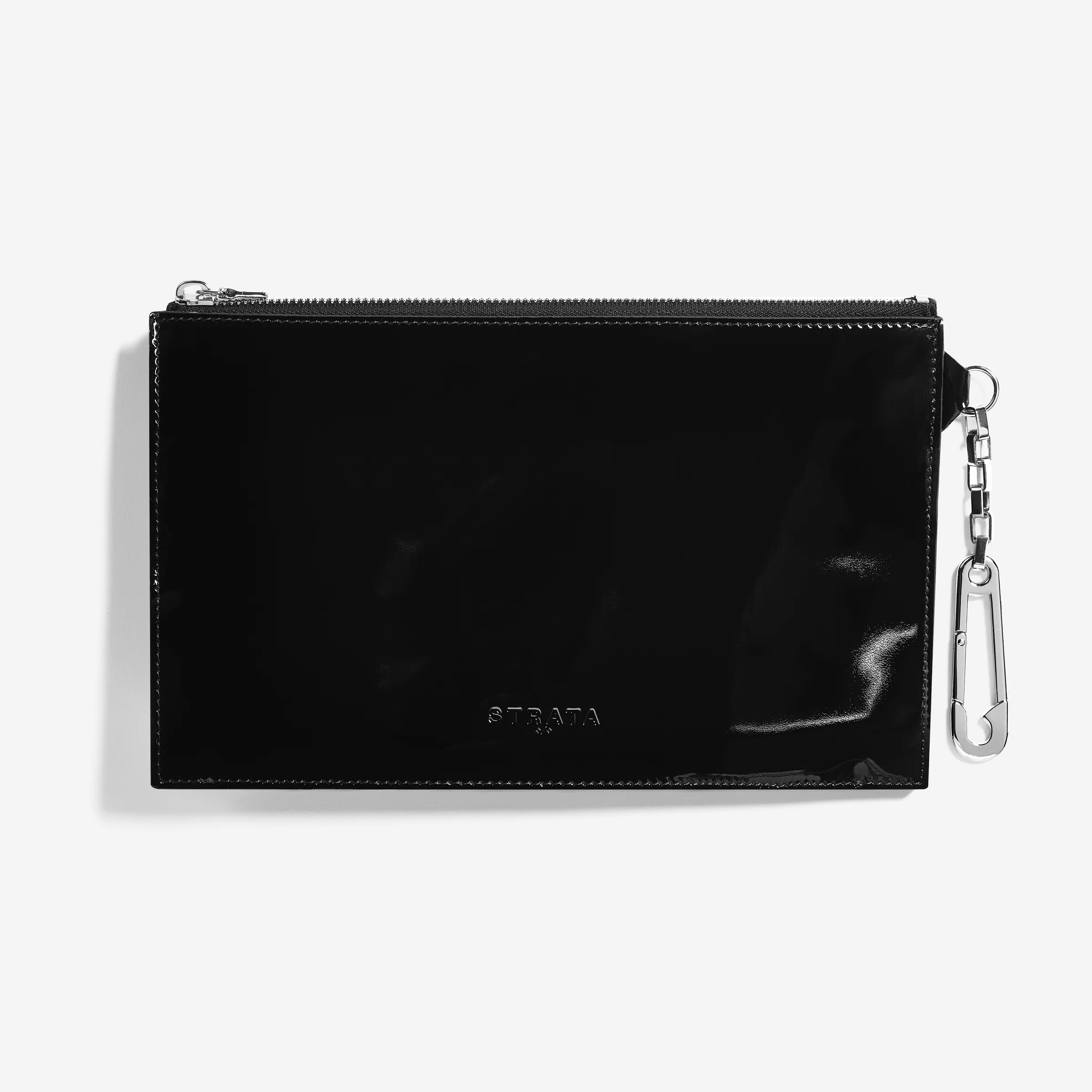 Black patent leather flat zip clutch with silver chain and carabiner clip on a white background, for Strata.