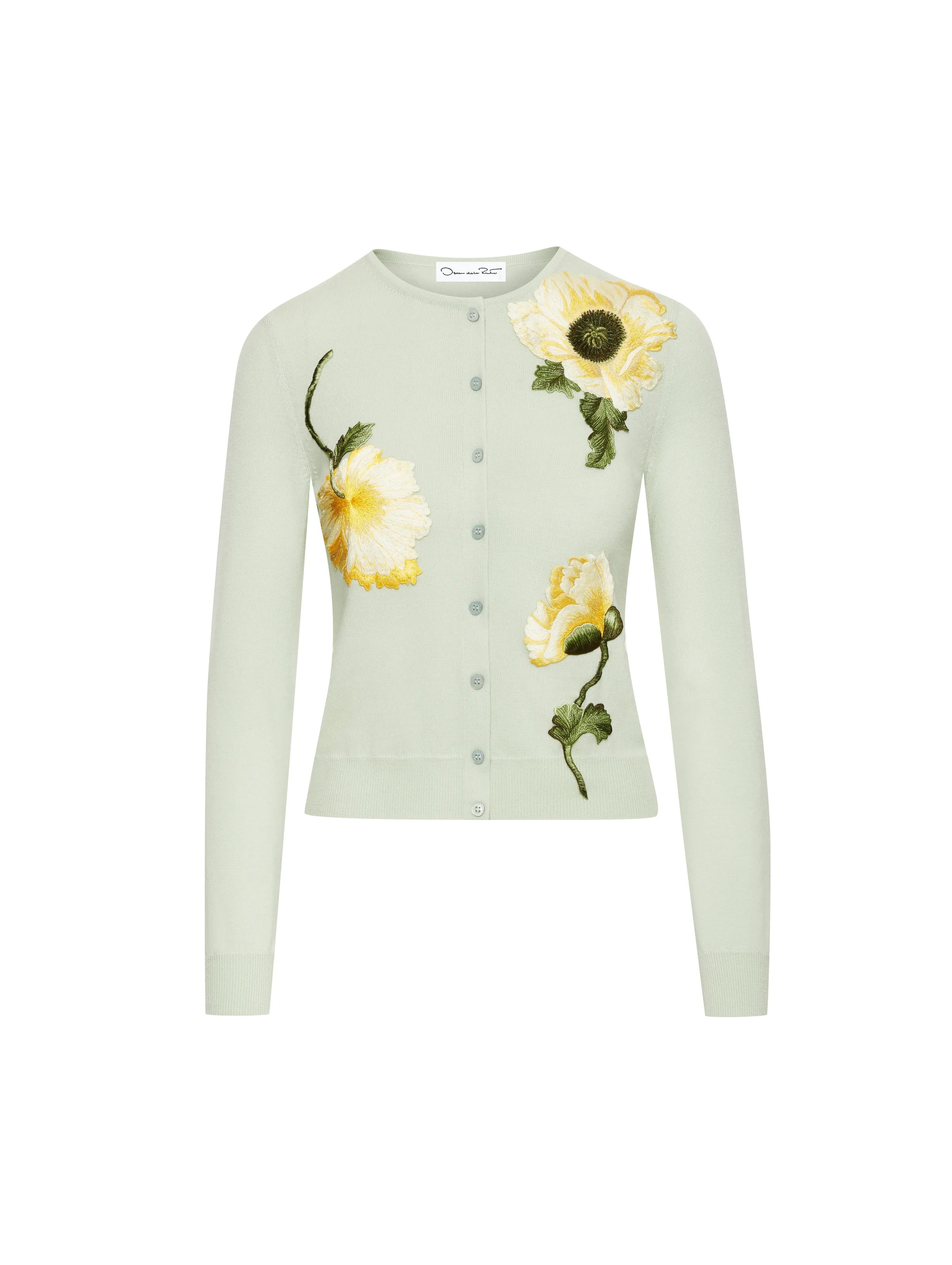 Mint green knit cardigan with yellow embroidered poppies, shown flat on a white background, for Oscar de la Renta.
