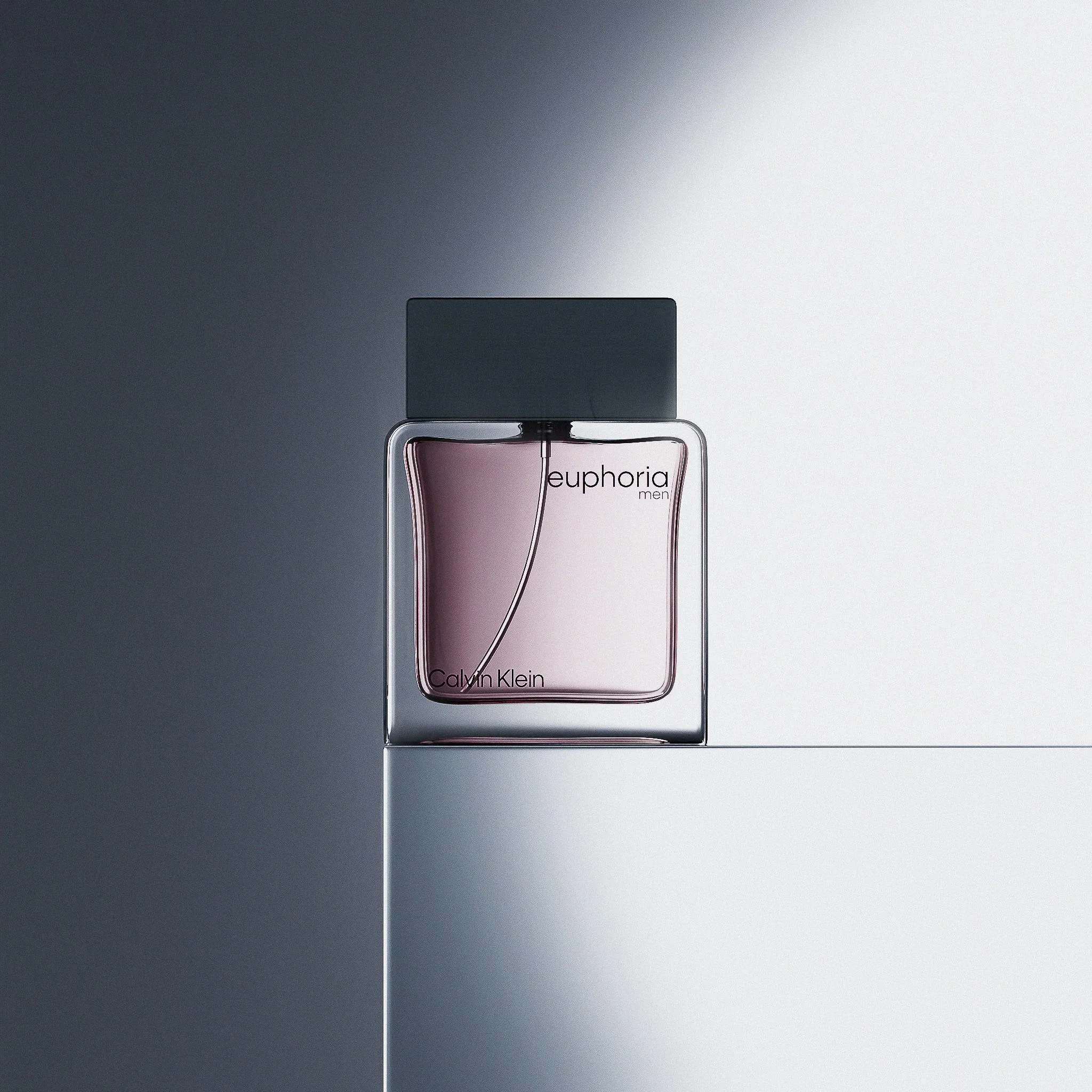 CGI render of a Euphoria Men perfume bottle with a dark cap on a white plinth in a beam of light, for Calvin Klein.