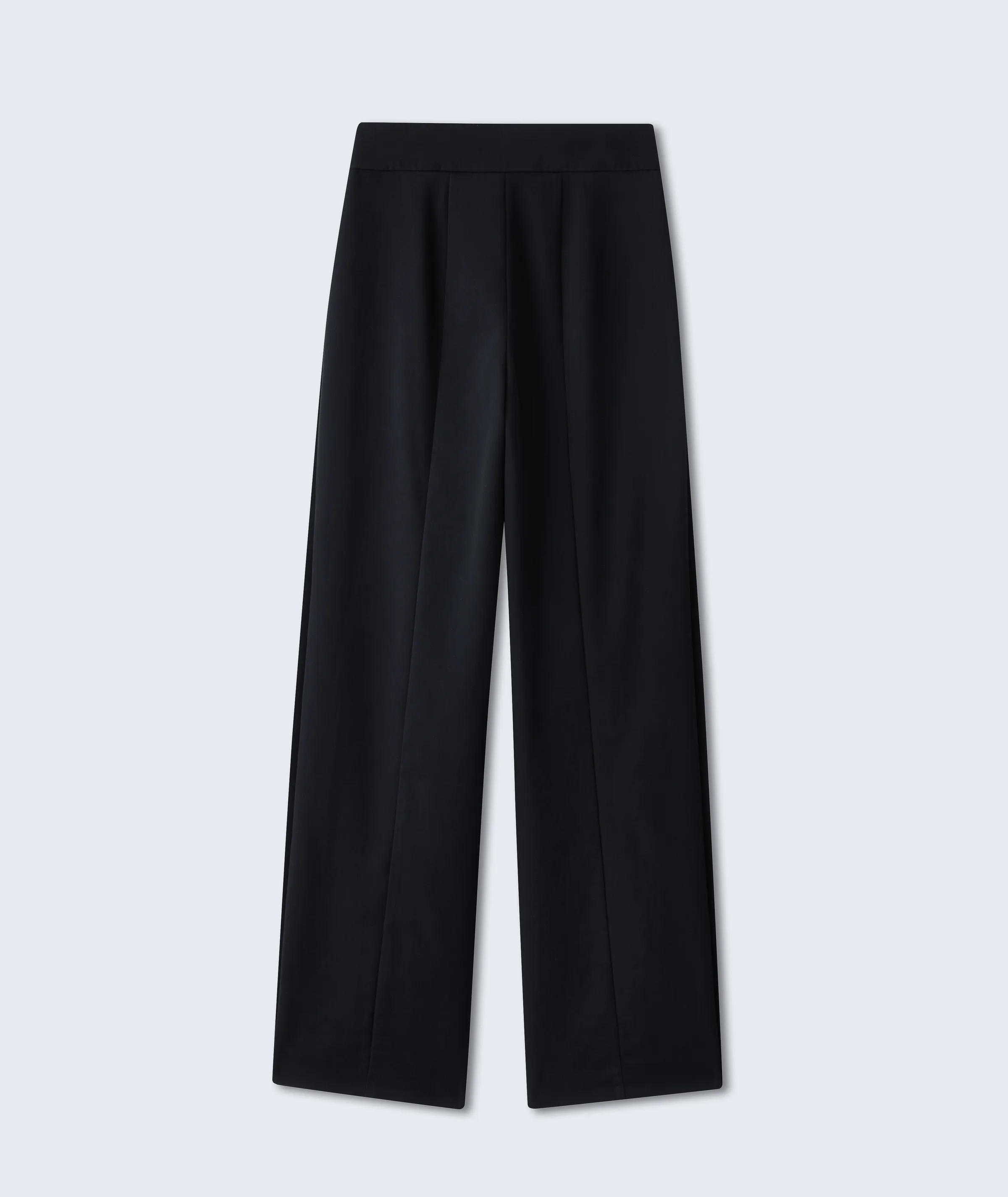 Black high-waisted wide-leg trousers with front seams, laid flat on a pale grey background, for Fforme.