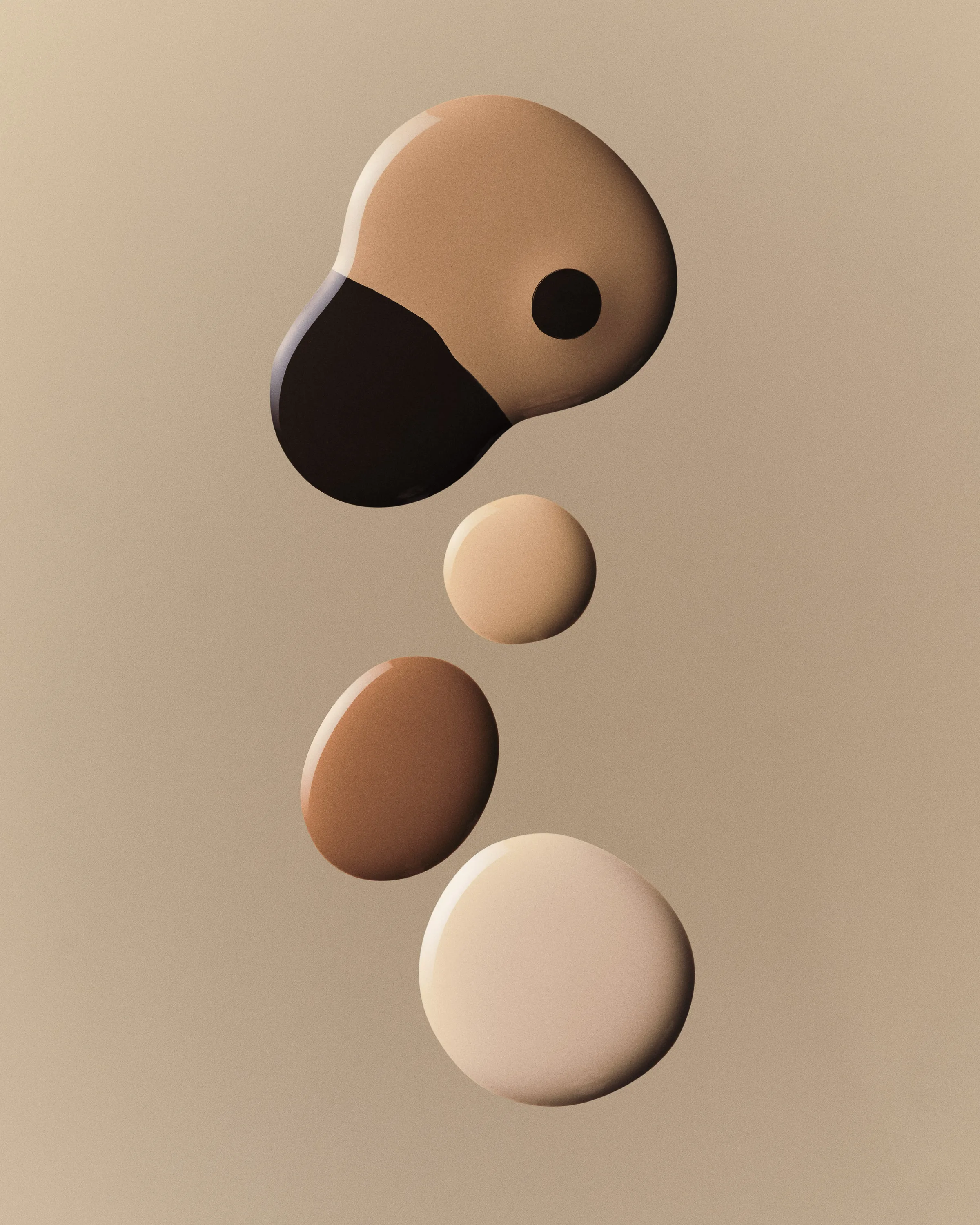 Glossy foundation swatches in five skin tones, from fair to deep, floating on a beige background, for Kylie Cosmetics.