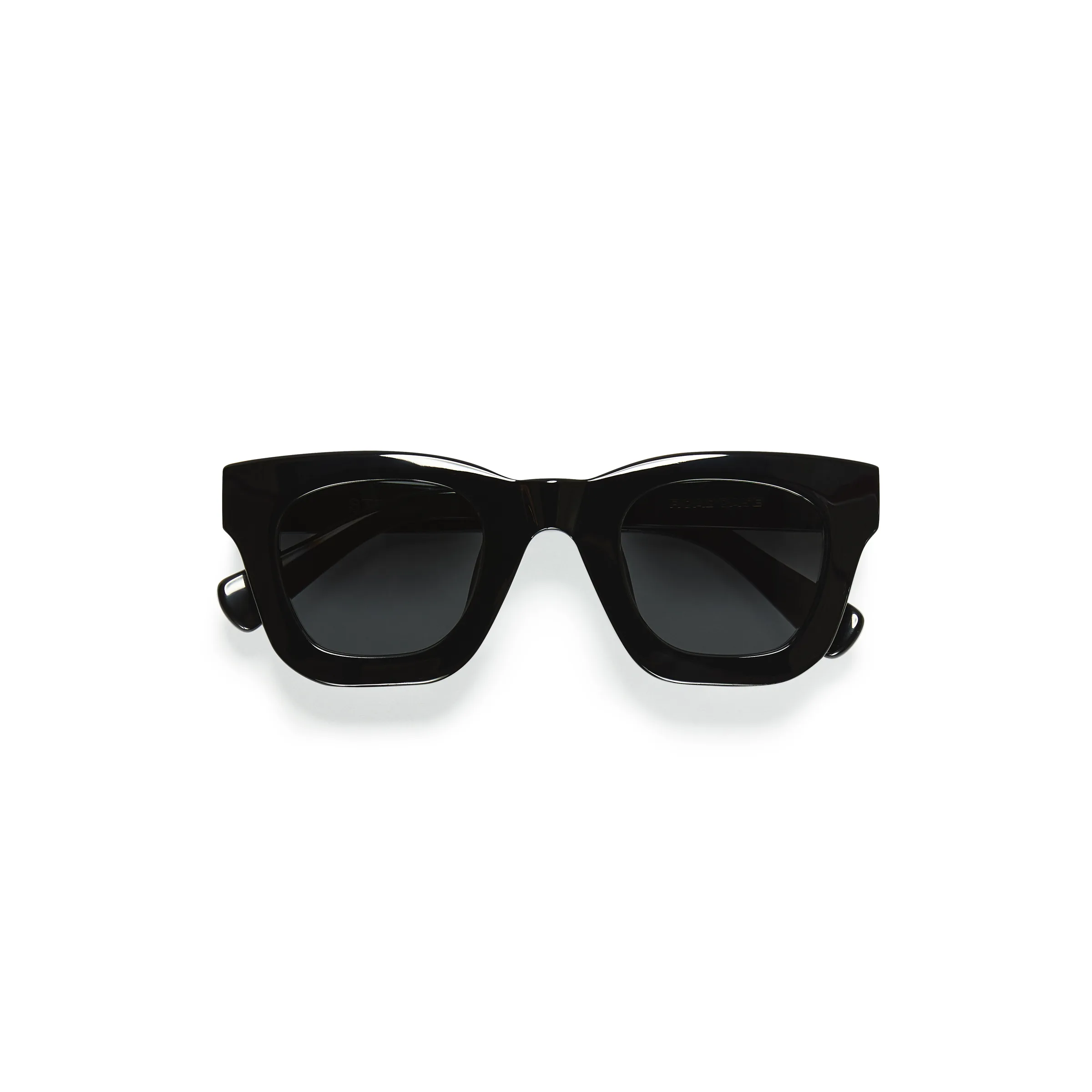 Thick black acetate square sunglasses with smoke lenses, folded on a white background, for Strata.