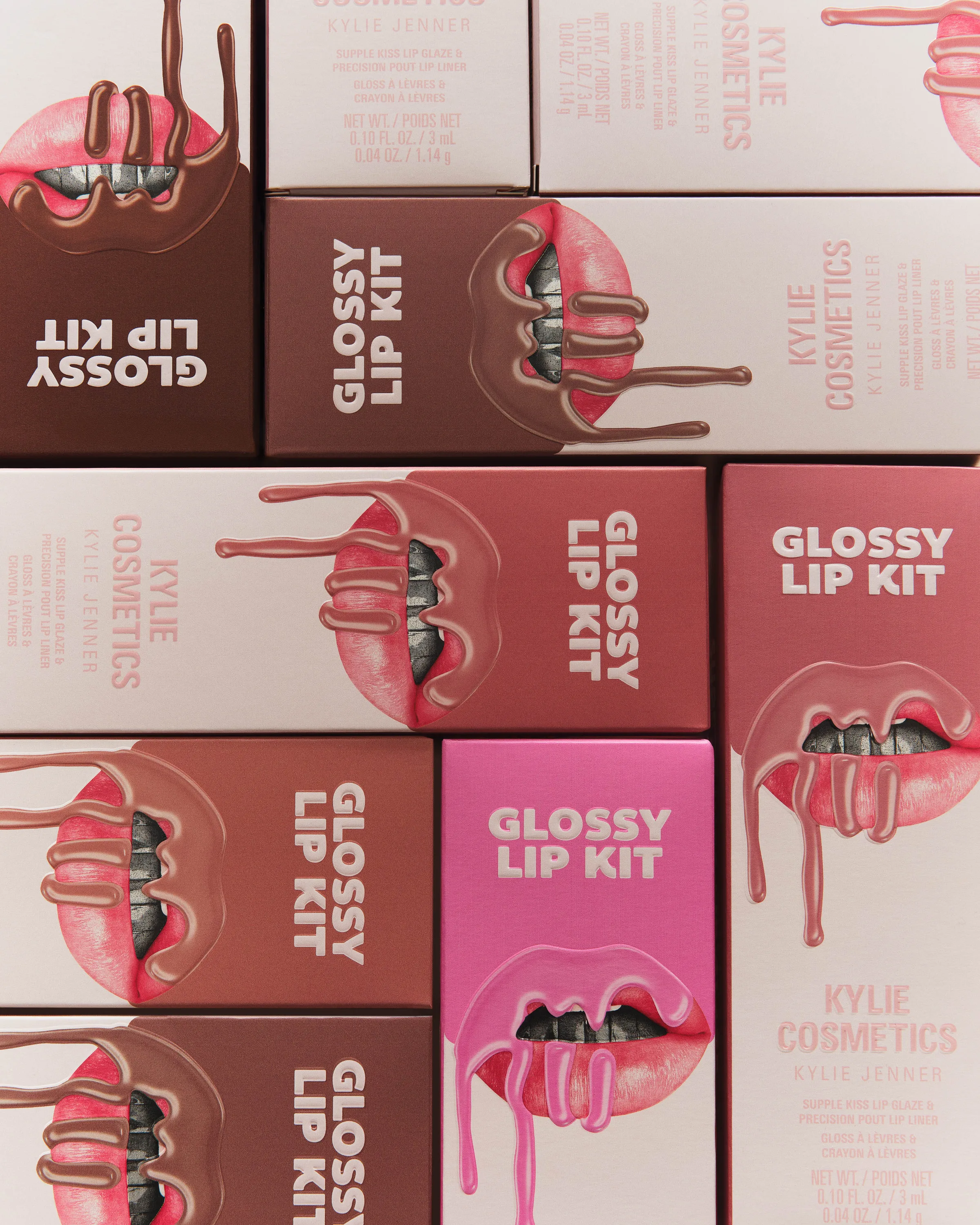 Stacked Glossy Lip Kit boxes in nude, brown and pink with dripping lip illustrations, for Kylie Cosmetics.