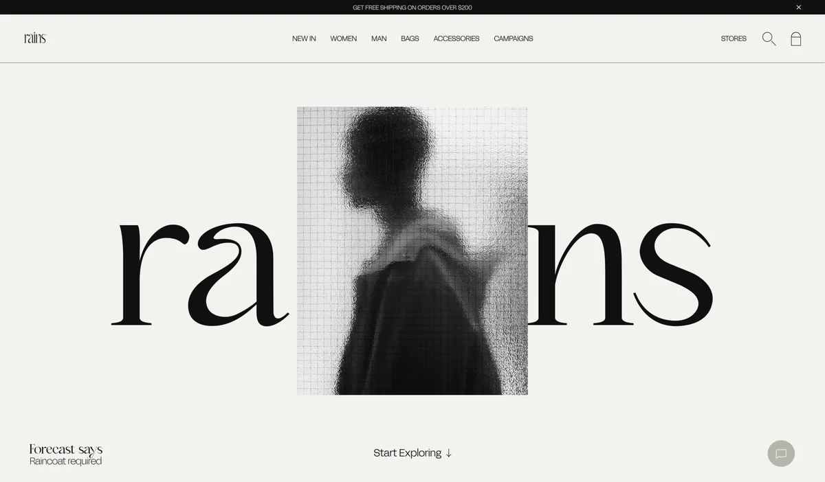 Website homepage with large serif wordmark split by a blurred figure behind frosted glass, for Rains.