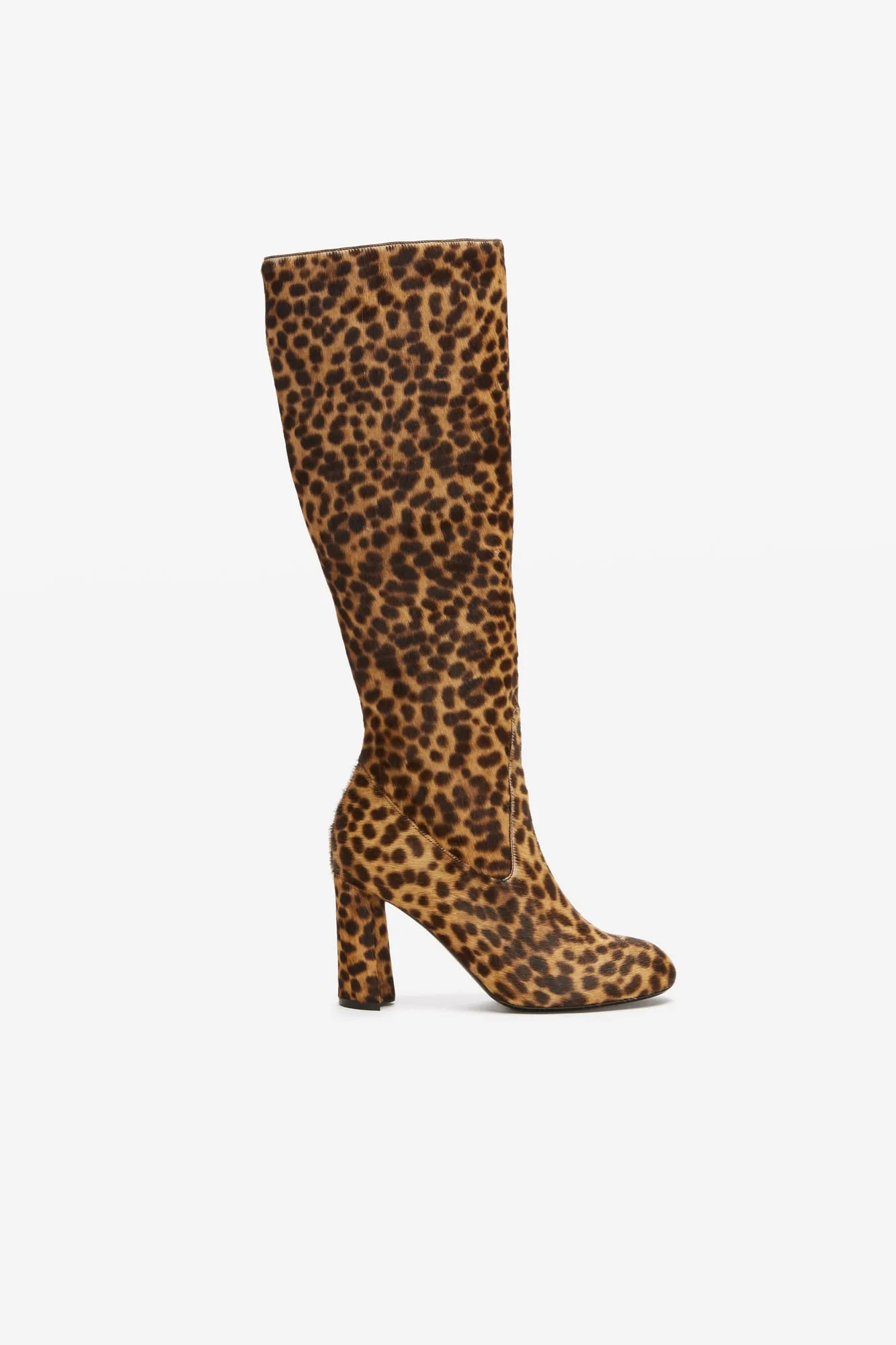 Leopard print calf hair knee-high boot with block heel, side view on white background, for Co Collections.