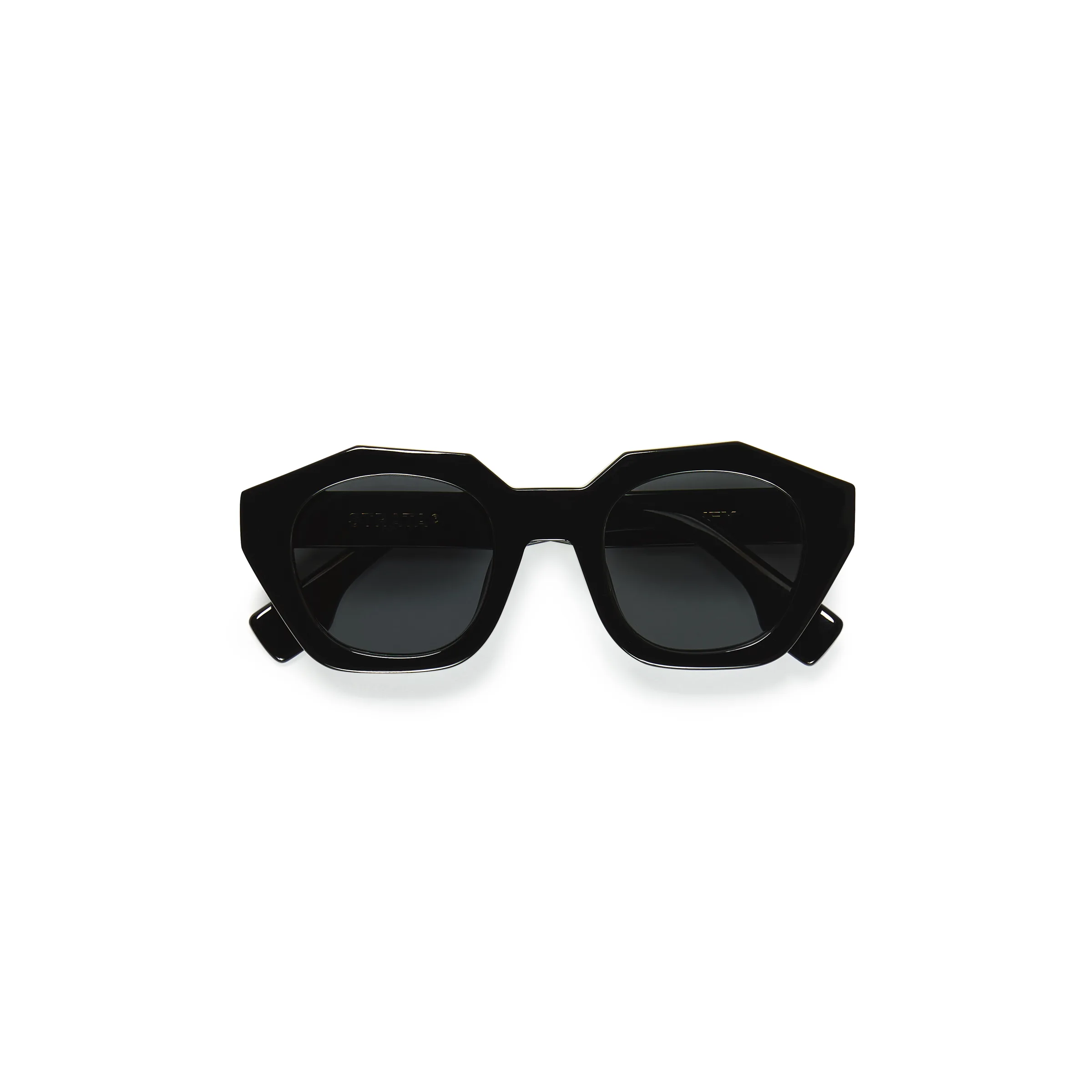 Folded black geometric acetate sunglasses with smoke lenses on a white background, for Strata.