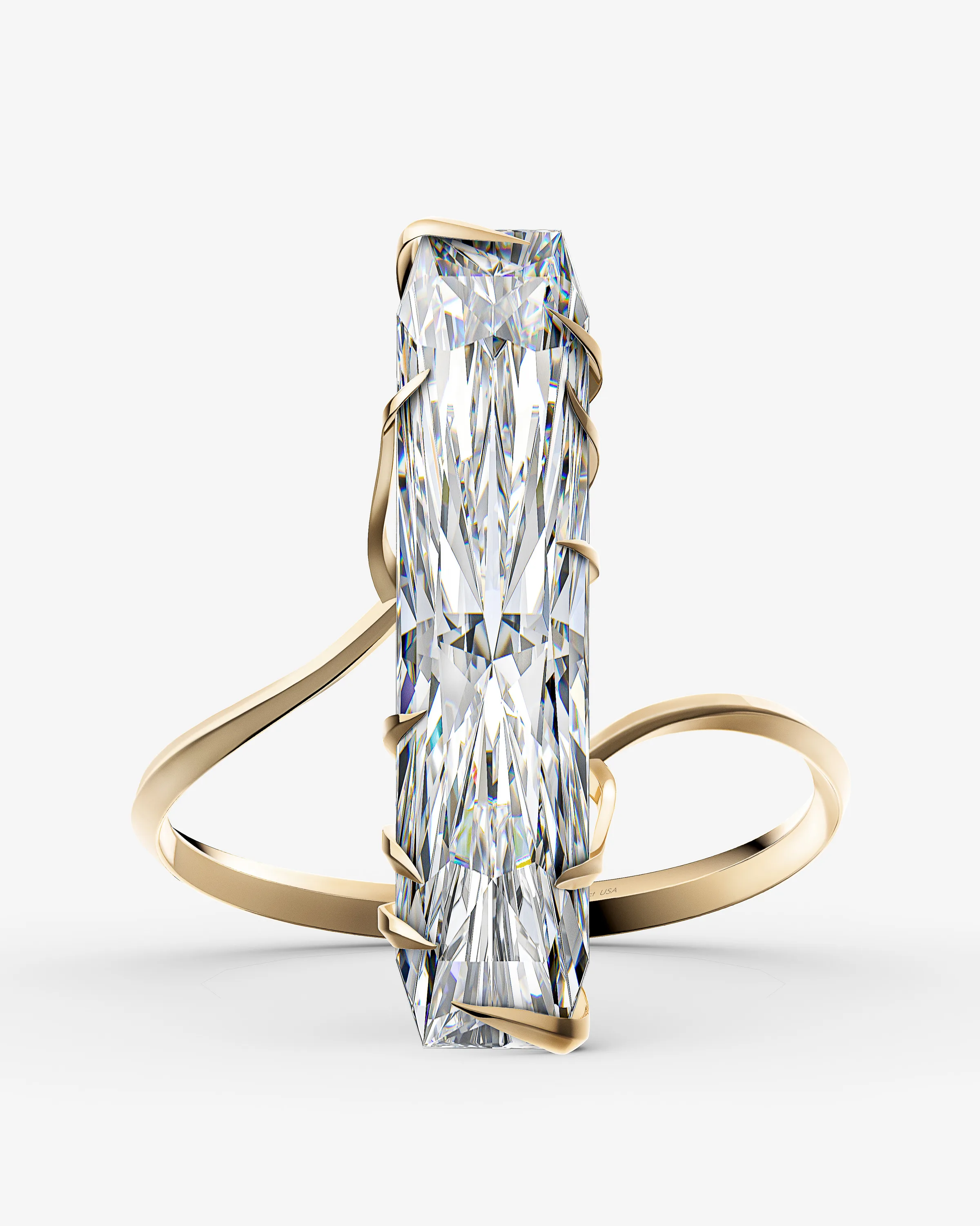 CGI render of a gold ring with a long rectangular diamond held by twisting prongs, on a white background, for Eddie Borgo.