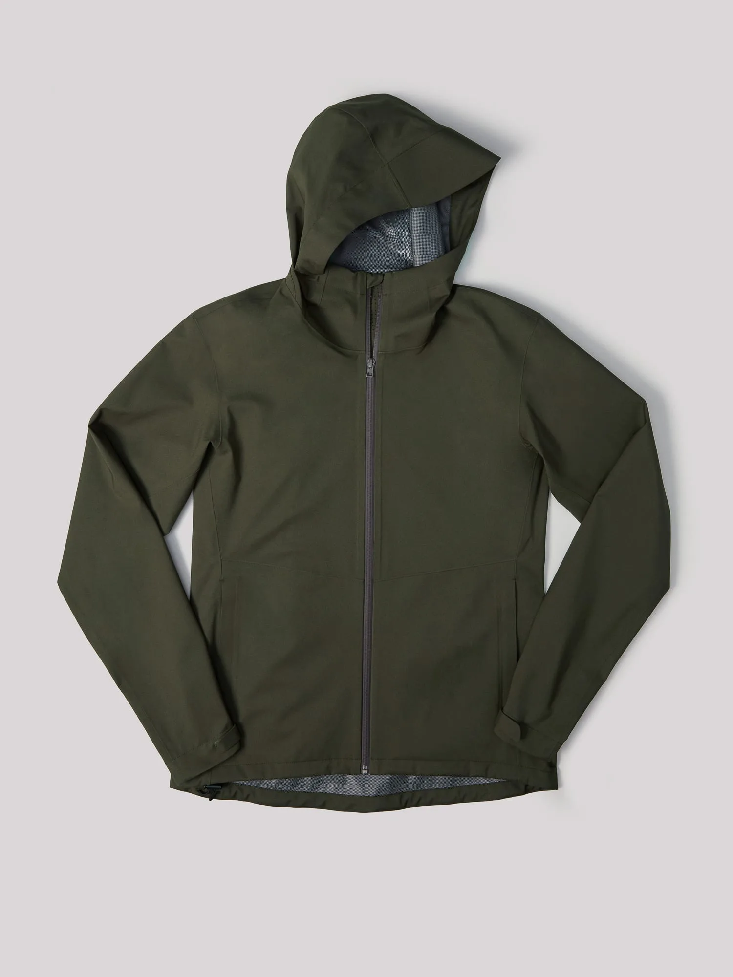 Olive green hooded rain jacket with full zip laid flat on a light grey background, for Uniqlo.