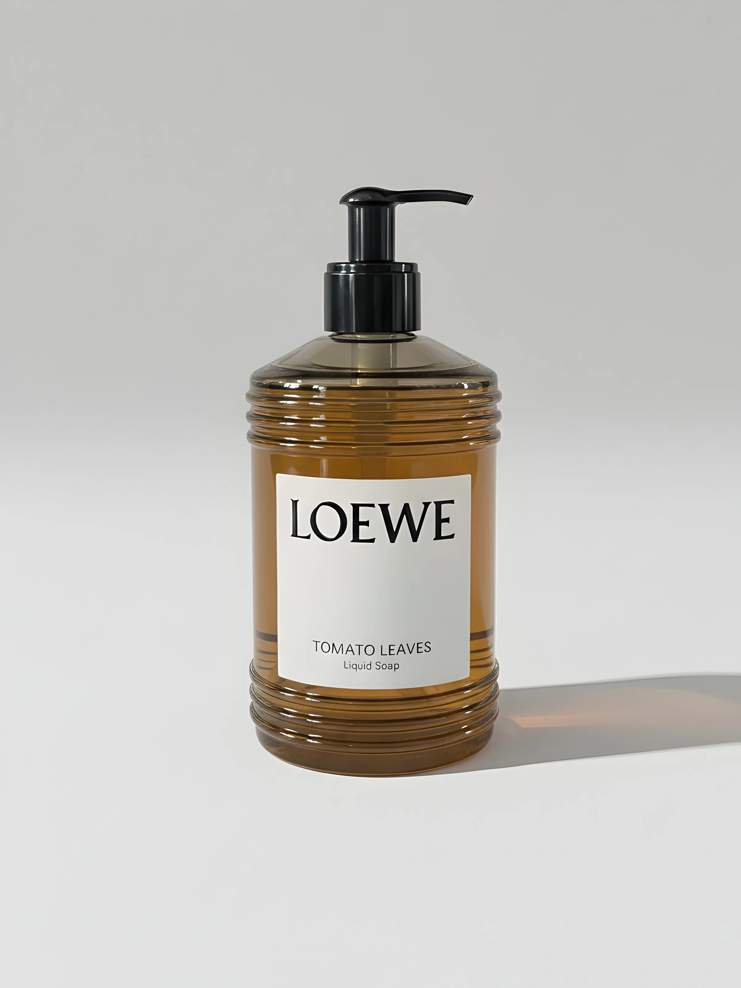 AI image of an amber ribbed Tomato Leaves liquid soap bottle with black pump on a white surface. Loewe AI Concept.