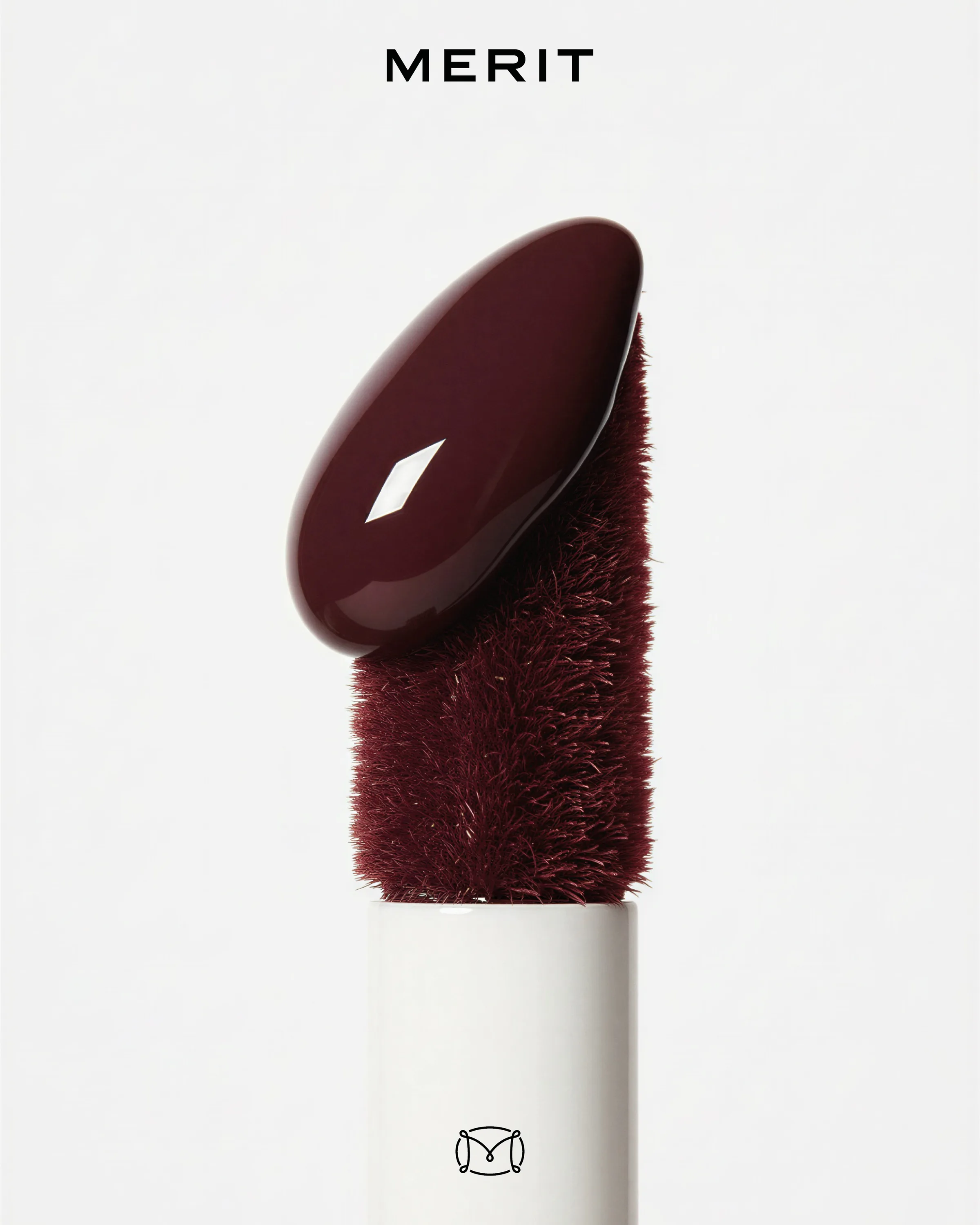 AI image of a flocked burgundy lip applicator topped with a glossy drop of colour on a white background. MERIT AI Concept.
