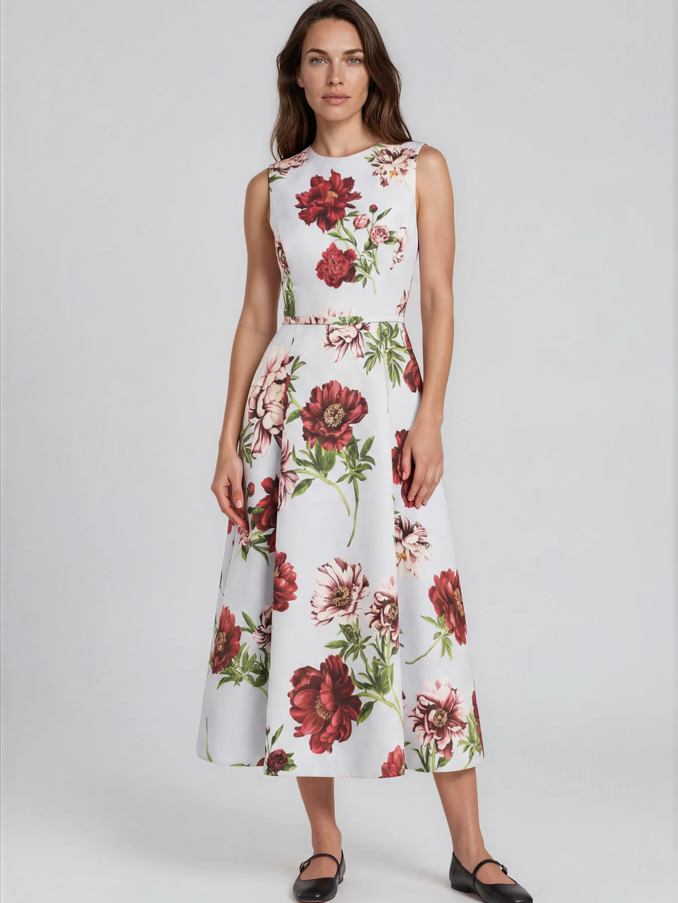 AI image of a model in a white sleeveless midi dress with red and pink peony print and black flats on grey. Oscar de la Renta AI Concept.