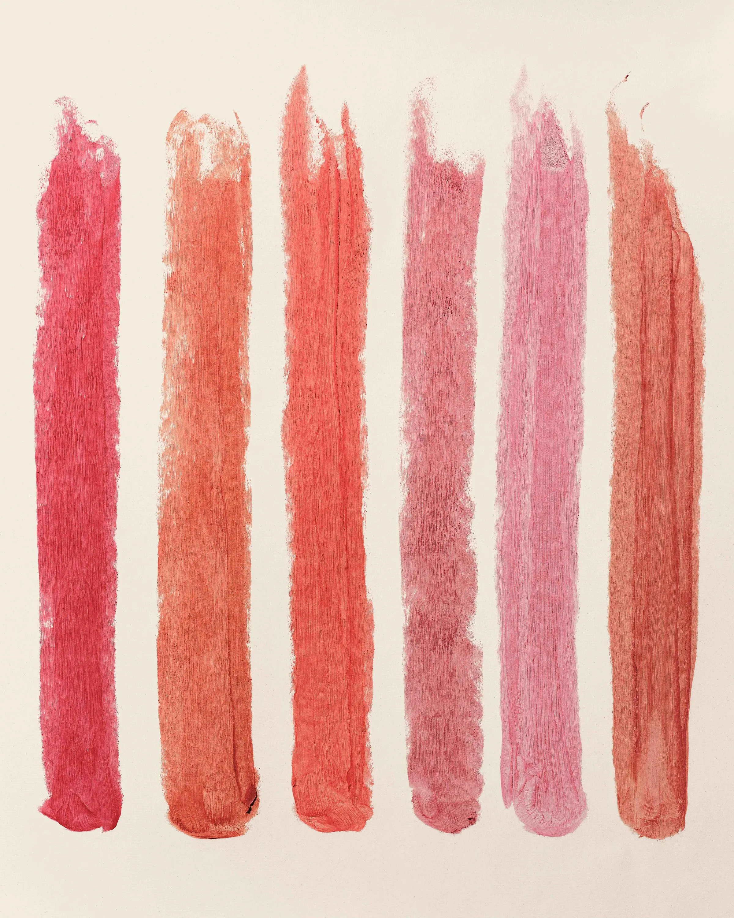 Six vertical lip product swatches in pink, coral and red shades on a cream background, for Kylie Cosmetics.