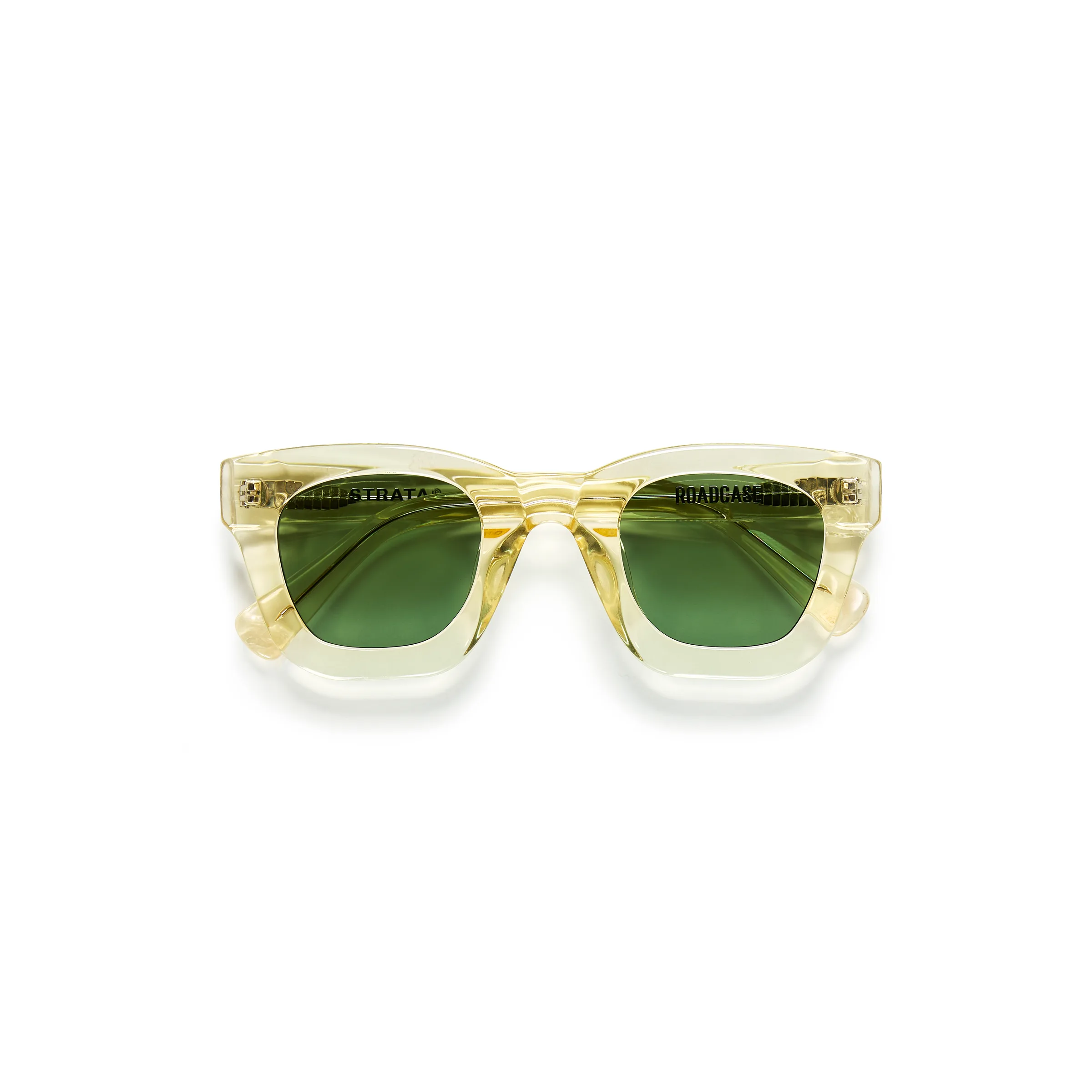 Folded translucent champagne acetate sunglasses with green lenses on a white background, for Strata.